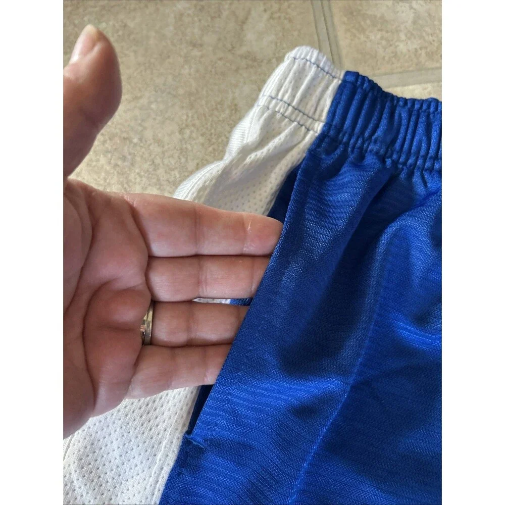 Nike athletic shorts Boys Size Small with pockets blue white